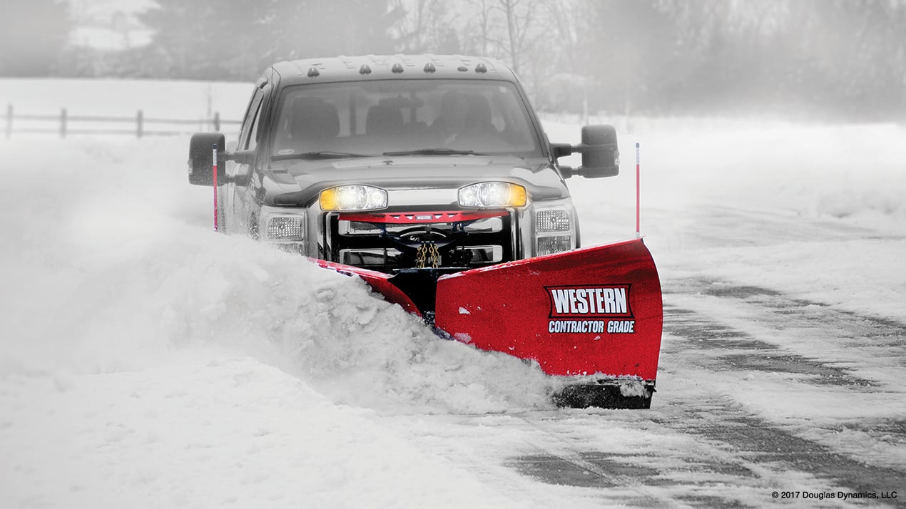 Black truck with a Western MVP 3 Snow Plow attached